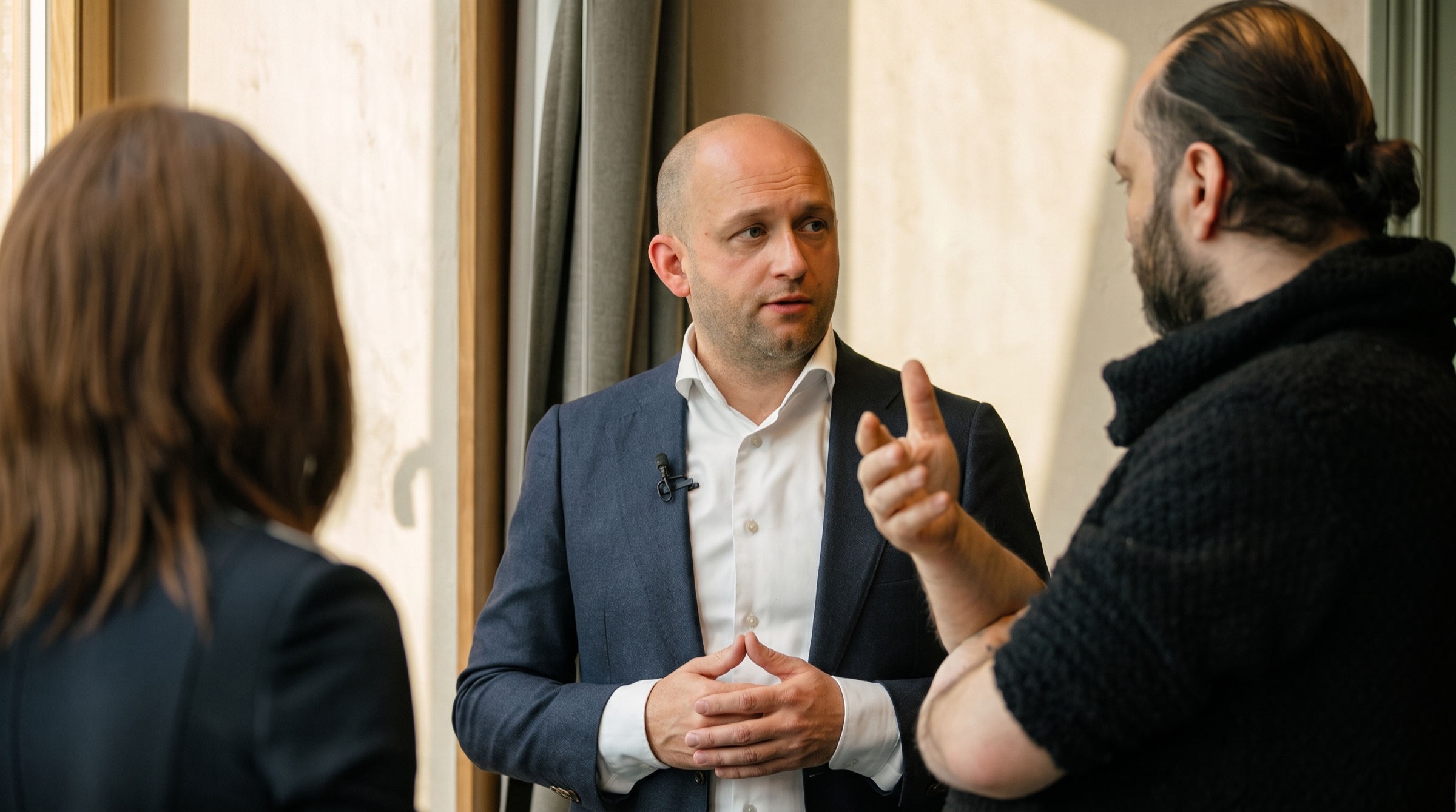 Vassili Touline in conversation with partners.